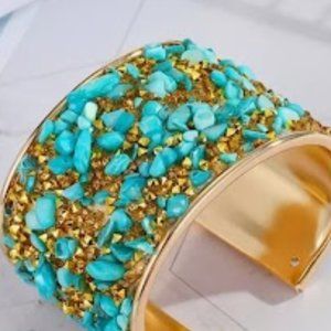 Wide cuff gold bracelet with beautiful  beautiful small stones